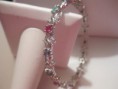 Emerald, sapphire and ruby sterling silver bangle bracelet